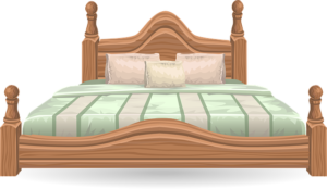 cama de madera con almohadas 