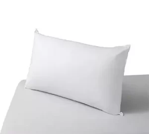 almohada blanca sobre colchon blanco